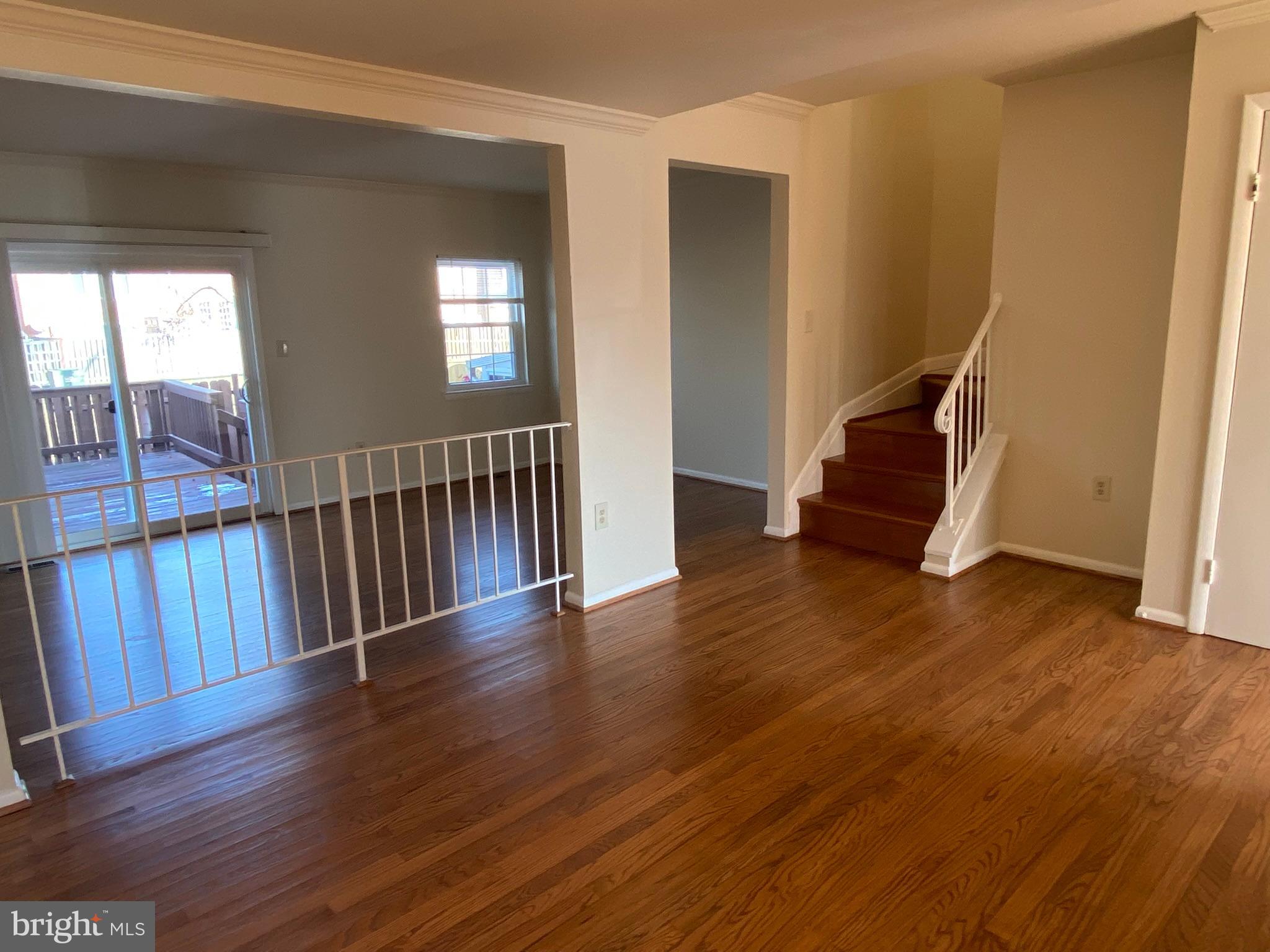 7432 Pohick Road Lorton, VA 22079 - Photo 4 of 27 a view of entryway with wooden floor and stairs