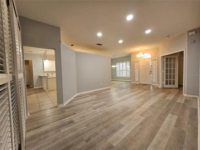 a view of a livingroom with wooden floor