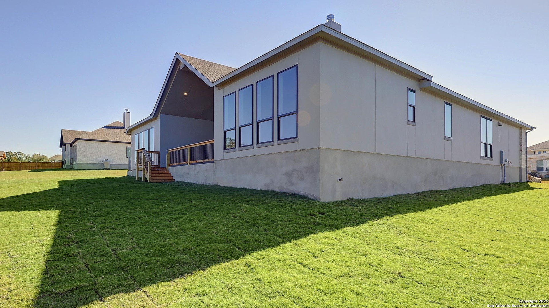 200 Violet Way Castroville, TX 78009 - Photo 27 of 32 a backyard of a house with lots of green space