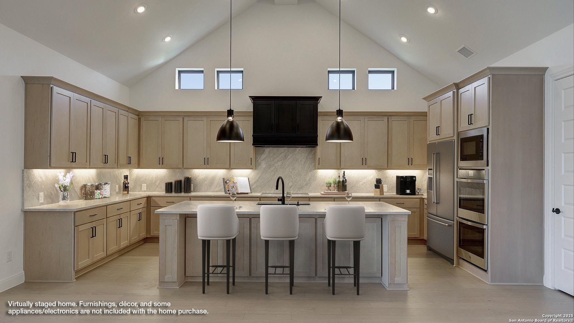 200 Violet Way Castroville, TX 78009 - Photo 3 of 32 a kitchen with cabinets and chairs