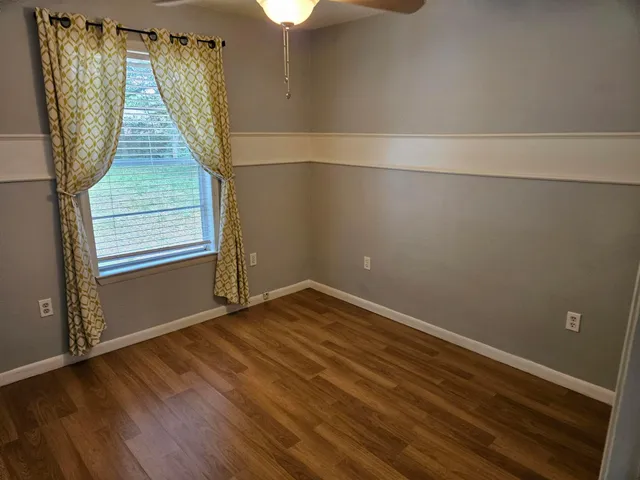 a view of a small space with racks on the wall