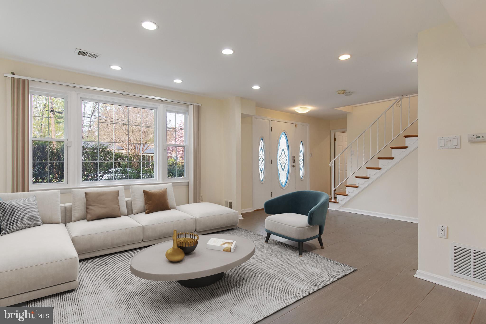 512 Carr Avenue Rockville, MD 20850 - Photo 11 of 56 a living room with furniture and a large window