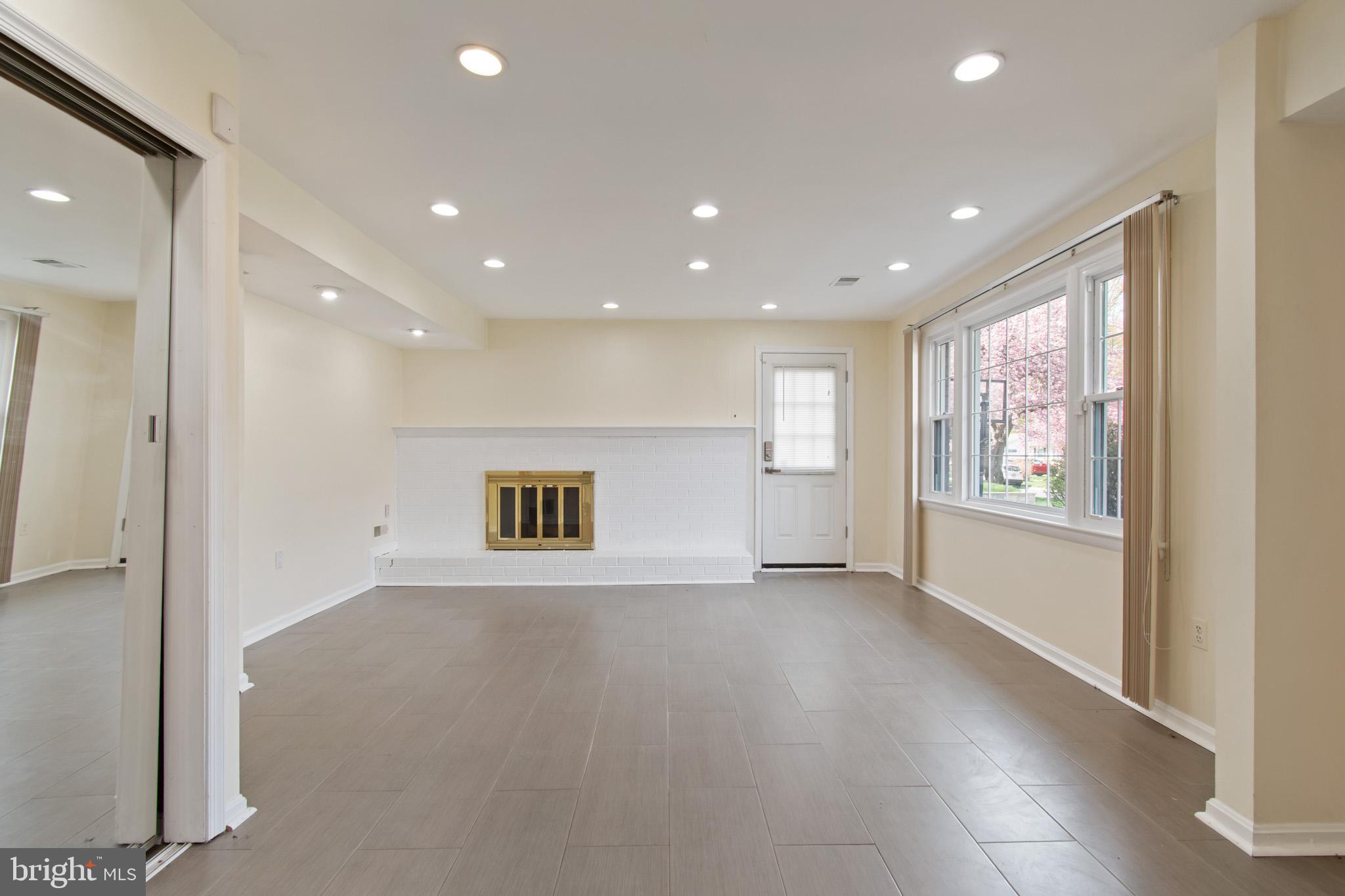 512 Carr Avenue Rockville, MD 20850 - Photo 12 of 56 a view of an empty room with a window