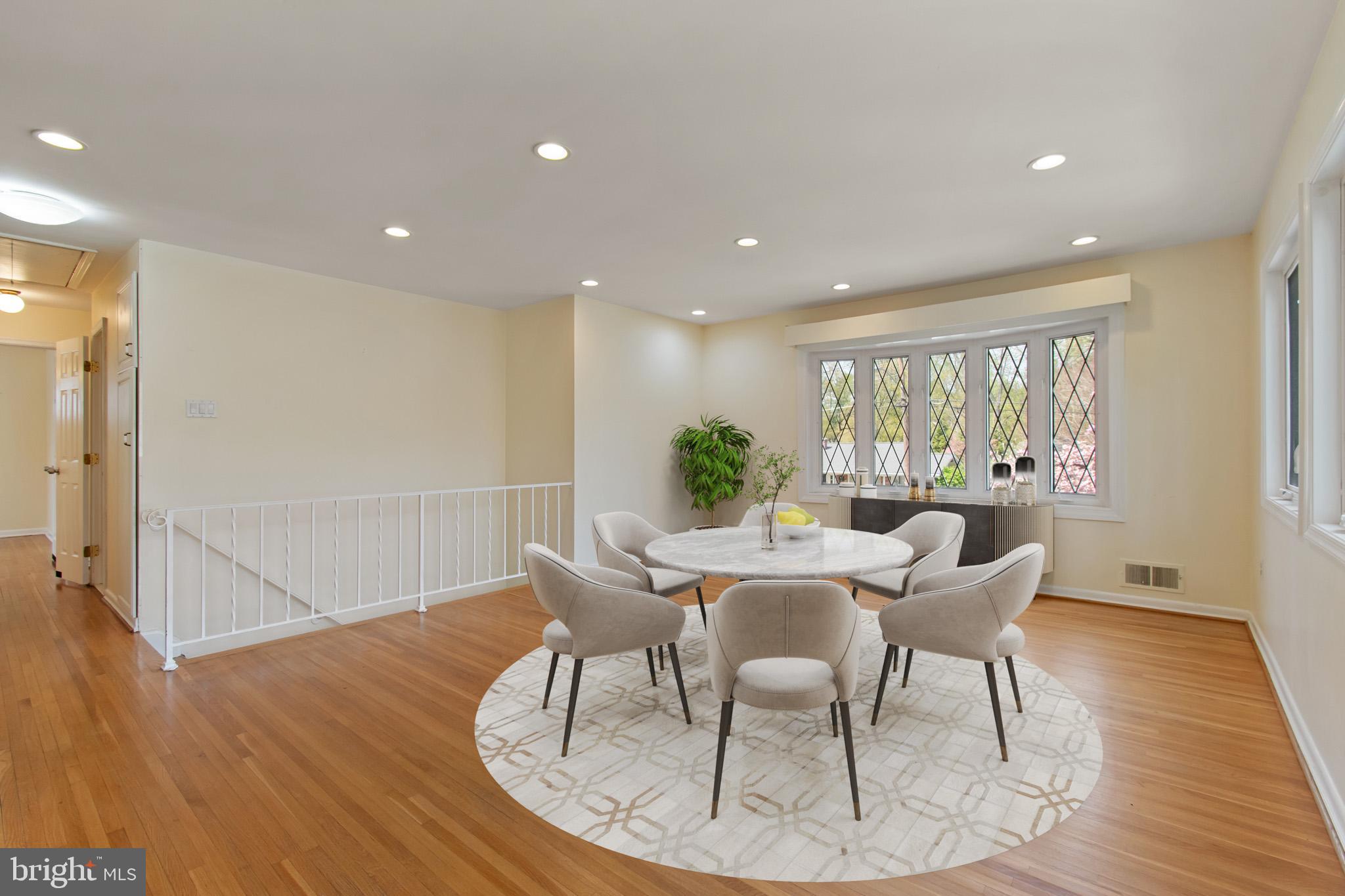 512 Carr Avenue Rockville, MD 20850 - Photo 20 of 56 a view of a dining room with furniture window and wooden floor