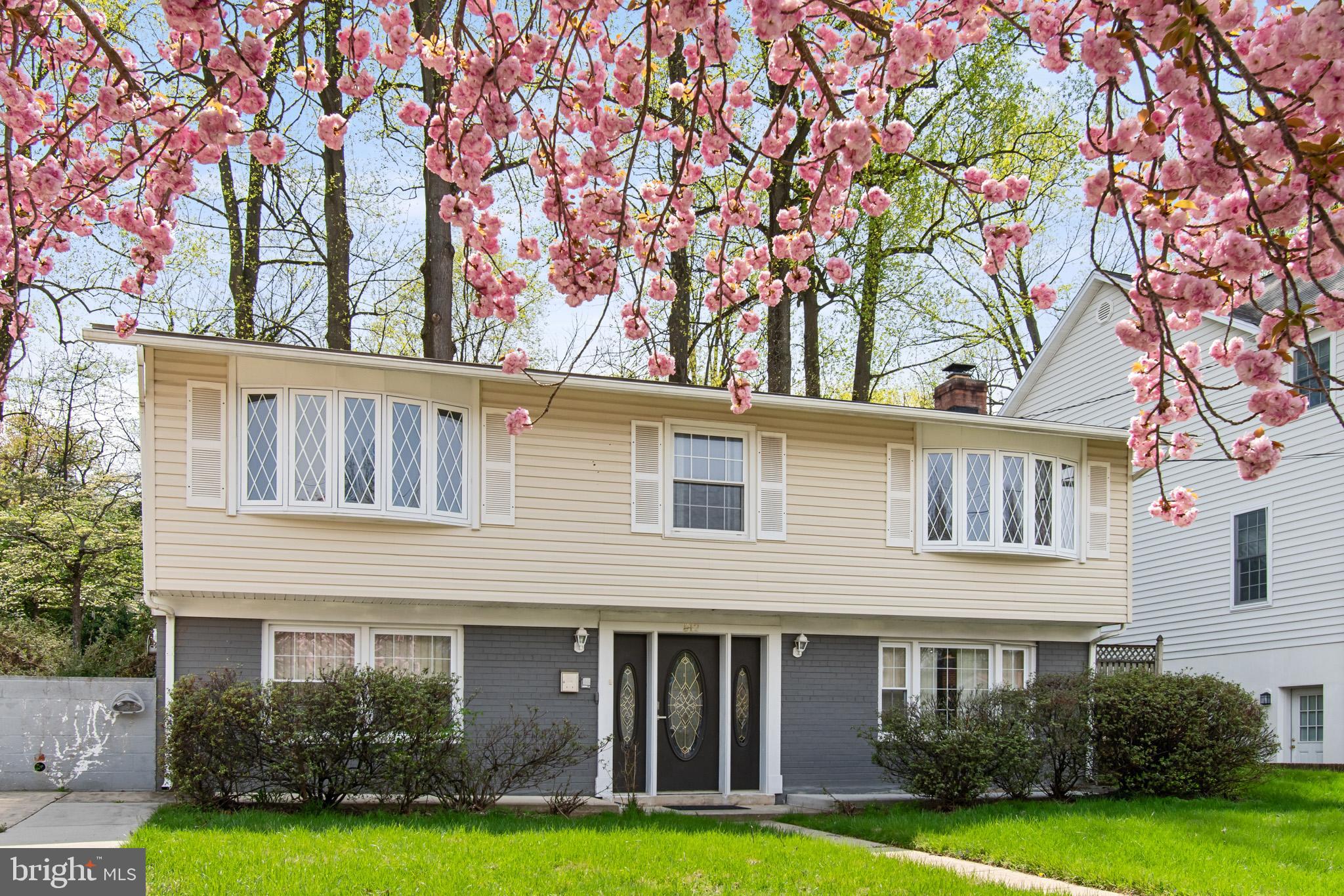 512 Carr Avenue Rockville, MD 20850 - Photo 2 of 56 a front view of a house with garden