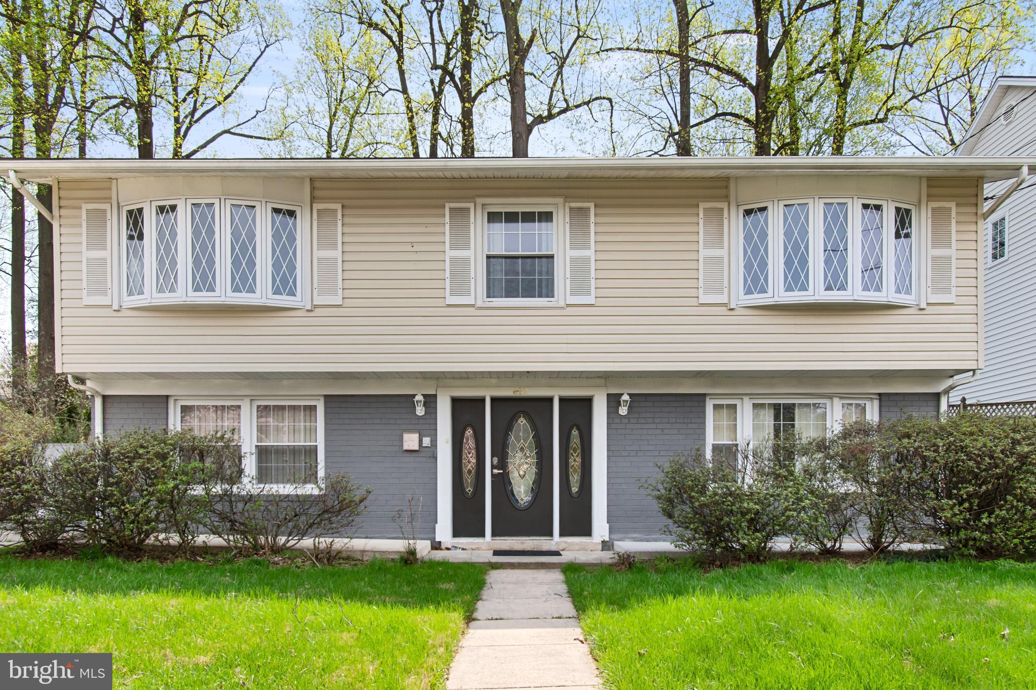 512 Carr Avenue Rockville, MD 20850 - Photo 3 of 56 front view of a house and a yard