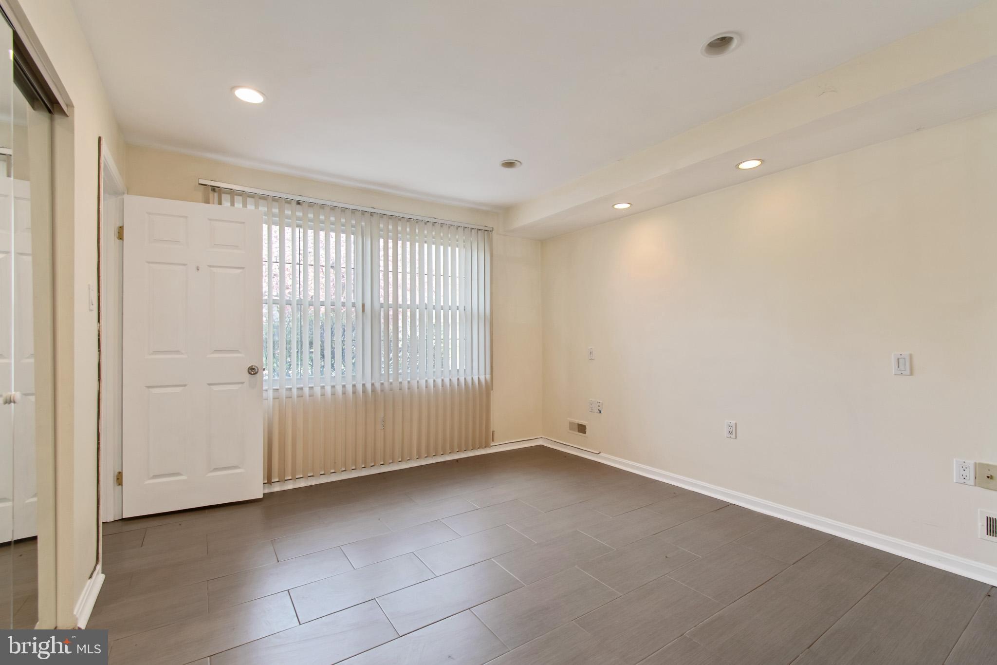 512 Carr Avenue Rockville, MD 20850 - Photo 34 of 56 a view of an empty room with a window