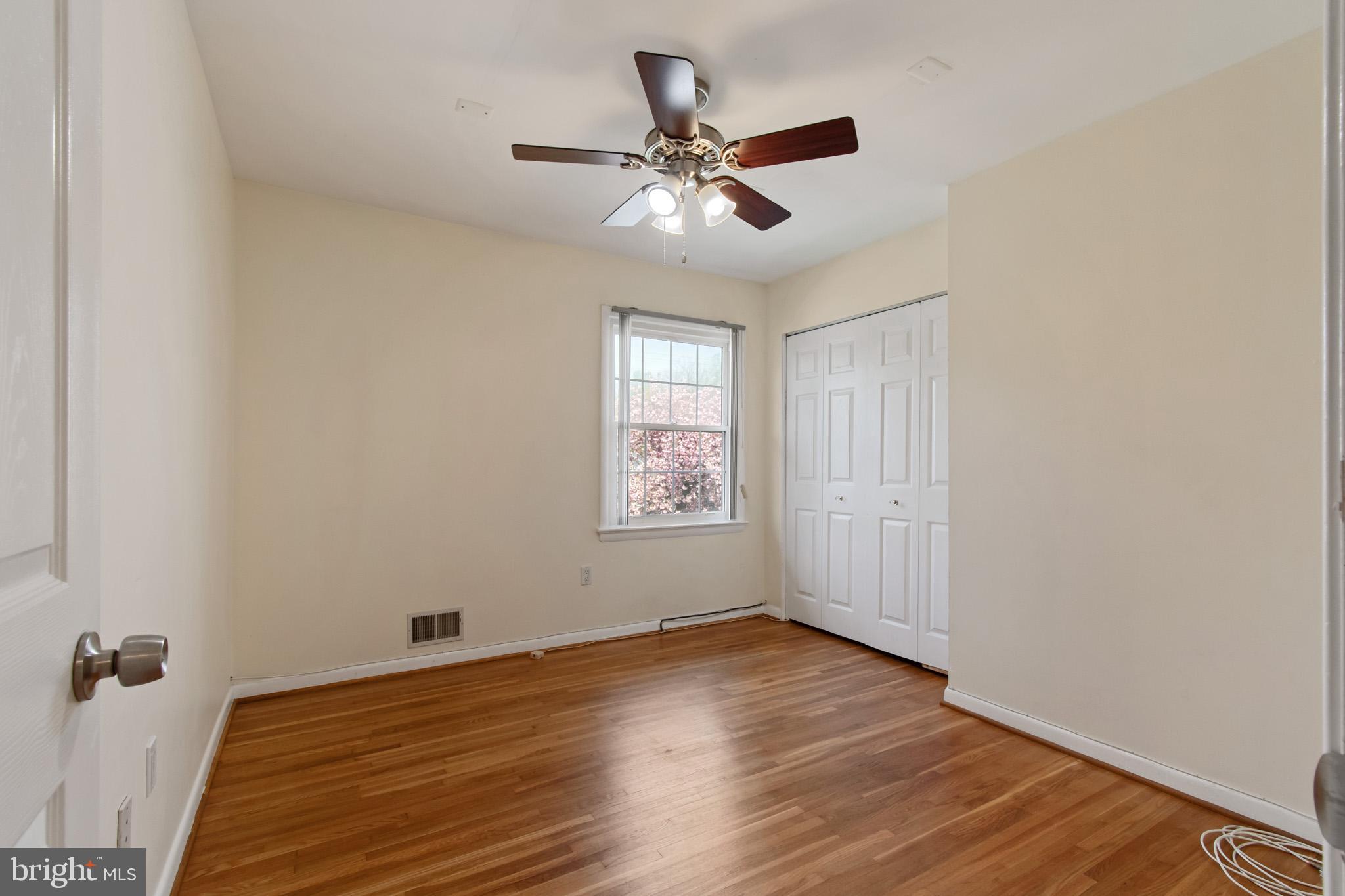 512 Carr Avenue Rockville, MD 20850 - Photo 38 of 56 wooden floor in an empty room with a window