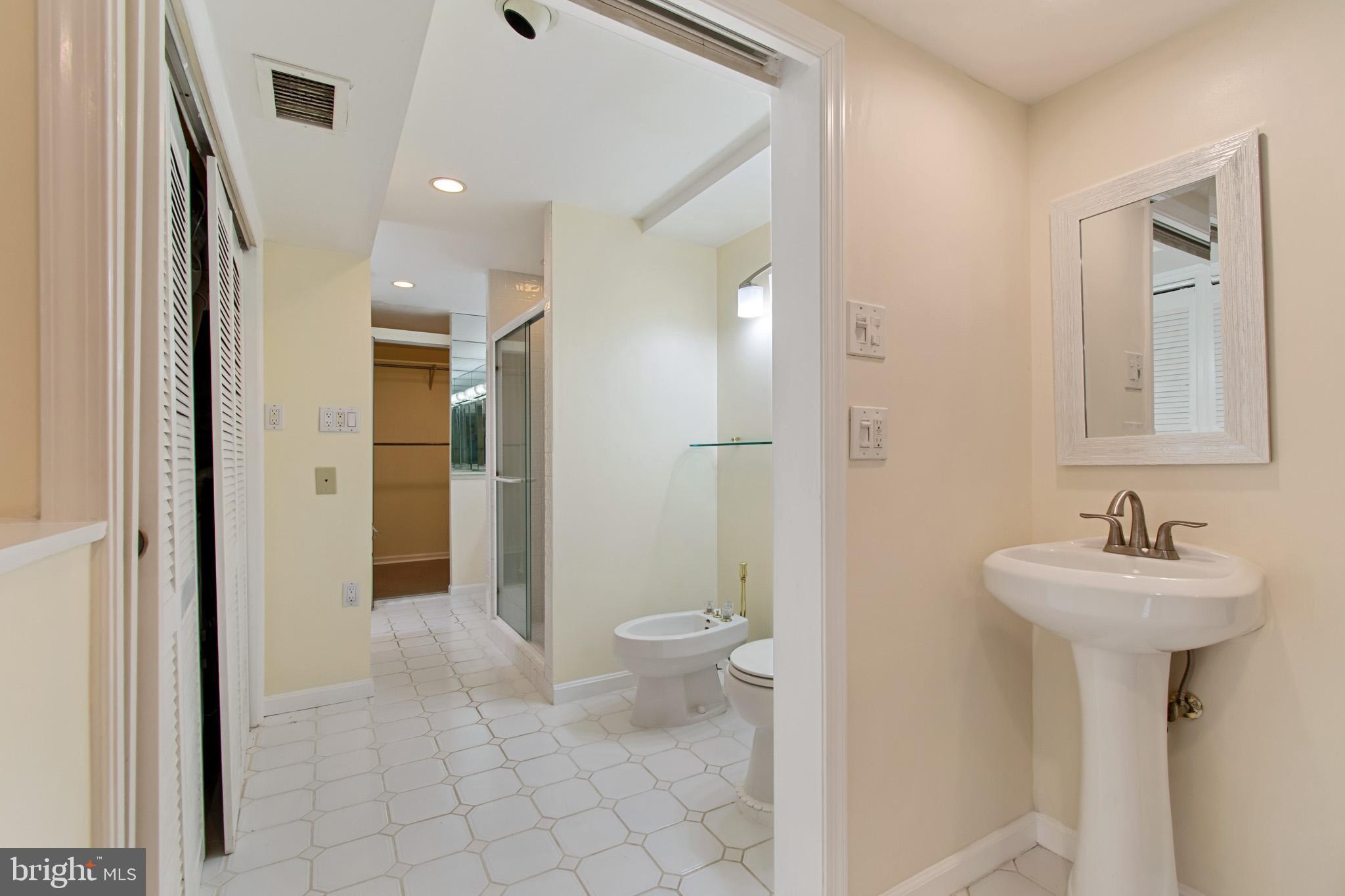 512 Carr Avenue Rockville, MD 20850 - Photo 48 of 56 a bathroom with a sink toilet and shower