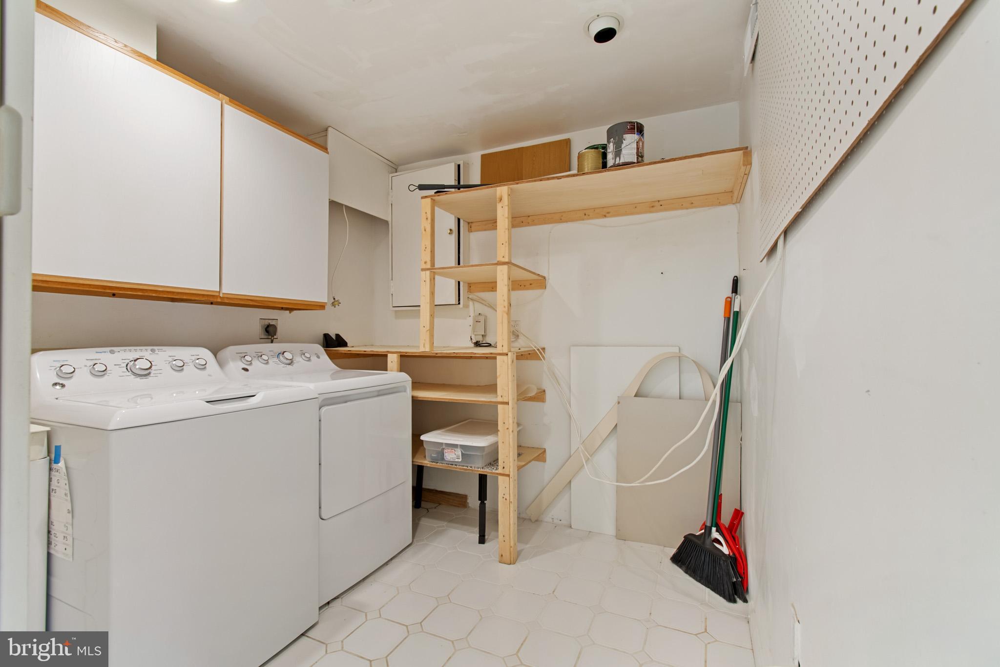 512 Carr Avenue Rockville, MD 20850 - Photo 52 of 56 a utility room with dryer and washer
