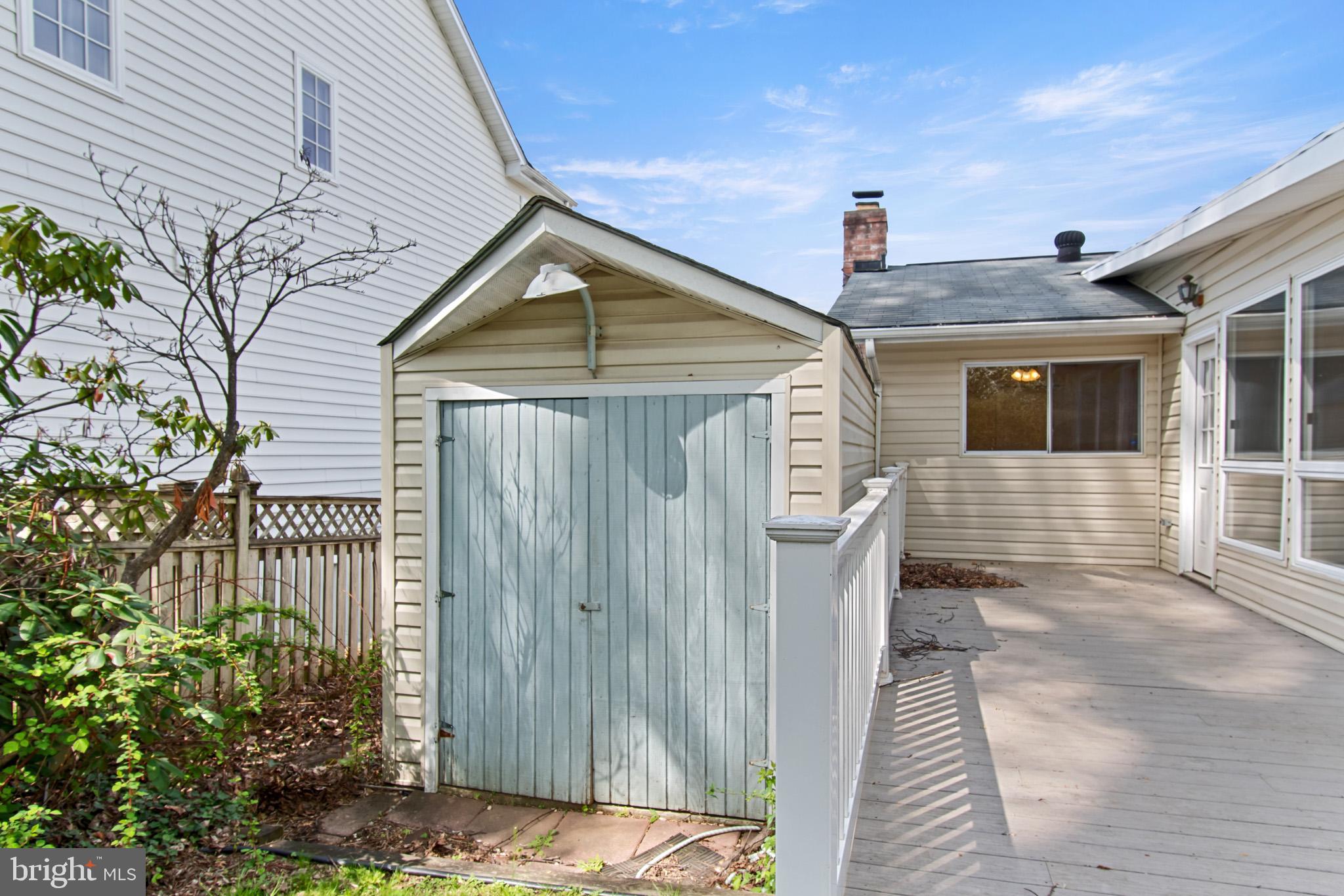 512 Carr Avenue Rockville, MD 20850 - Photo 53 of 56 a front view of a house with a yard