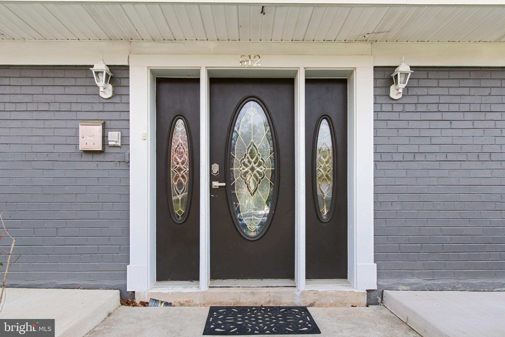512 Carr Avenue Rockville, MD 20850 - Photo 6 of 56 a front view of a wooden door