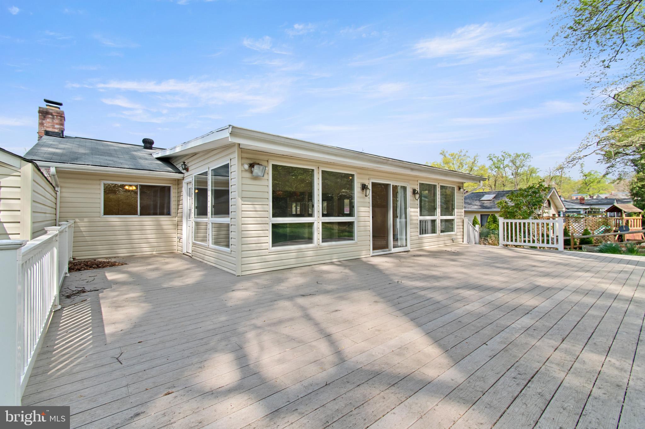 512 Carr Avenue Rockville, MD 20850 - Photo 7 of 56 a view of a house with a yard
