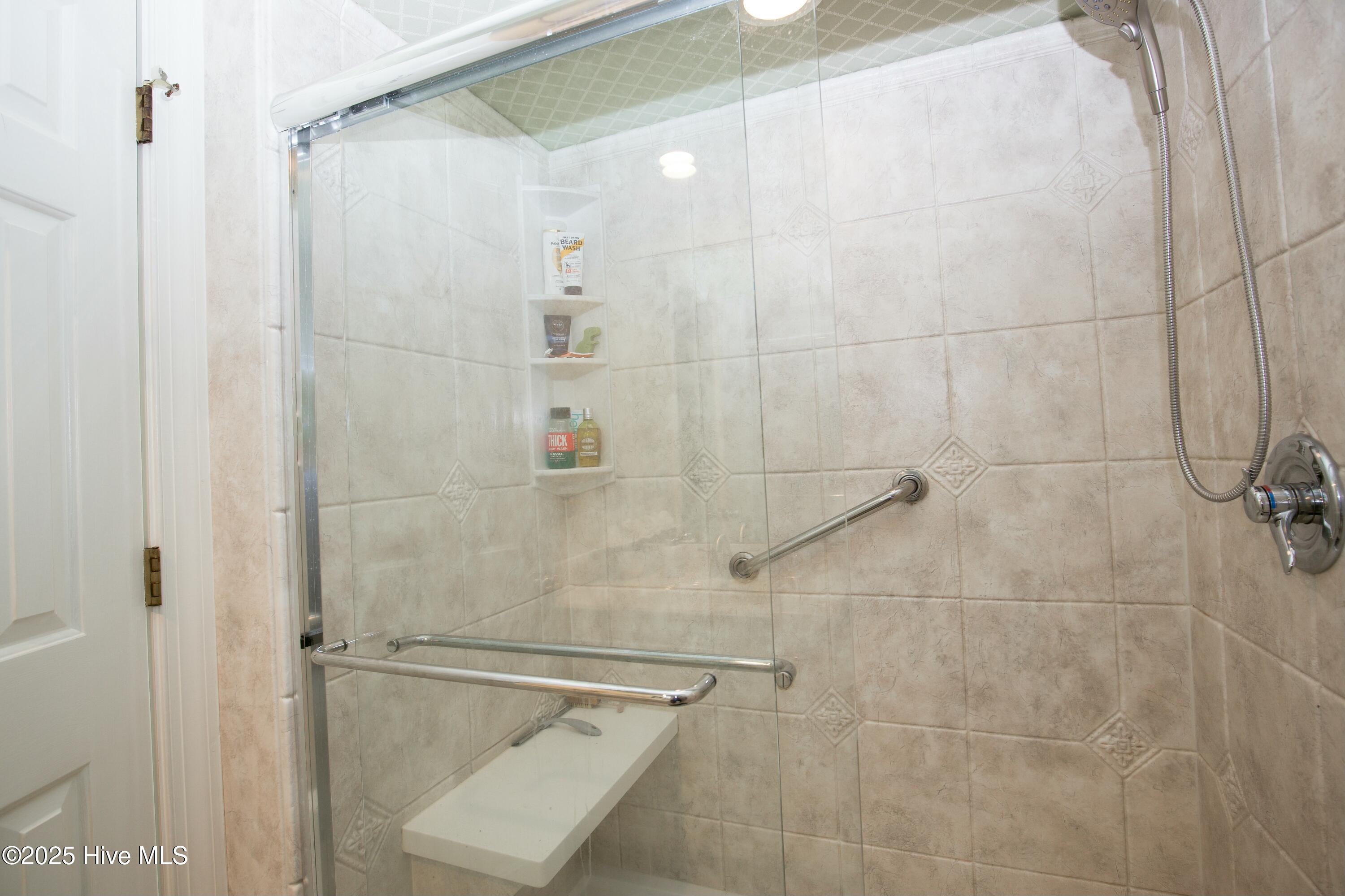 1102 Mt Washington Circle Pinehurst, NC 28374 - Photo 28 of 48 shower with seat