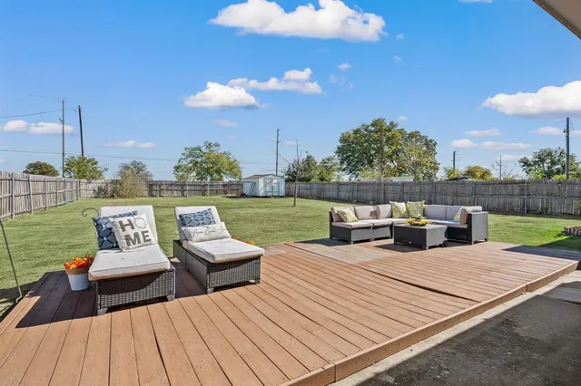 a view of a roof deck with couches