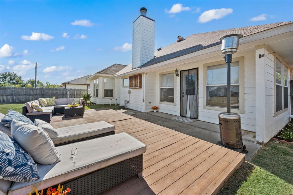 305 Maverick Trail Oak Point, TX 75068 - Photo 33 of 40 a view of a patio with couches chairs and wooden floor
