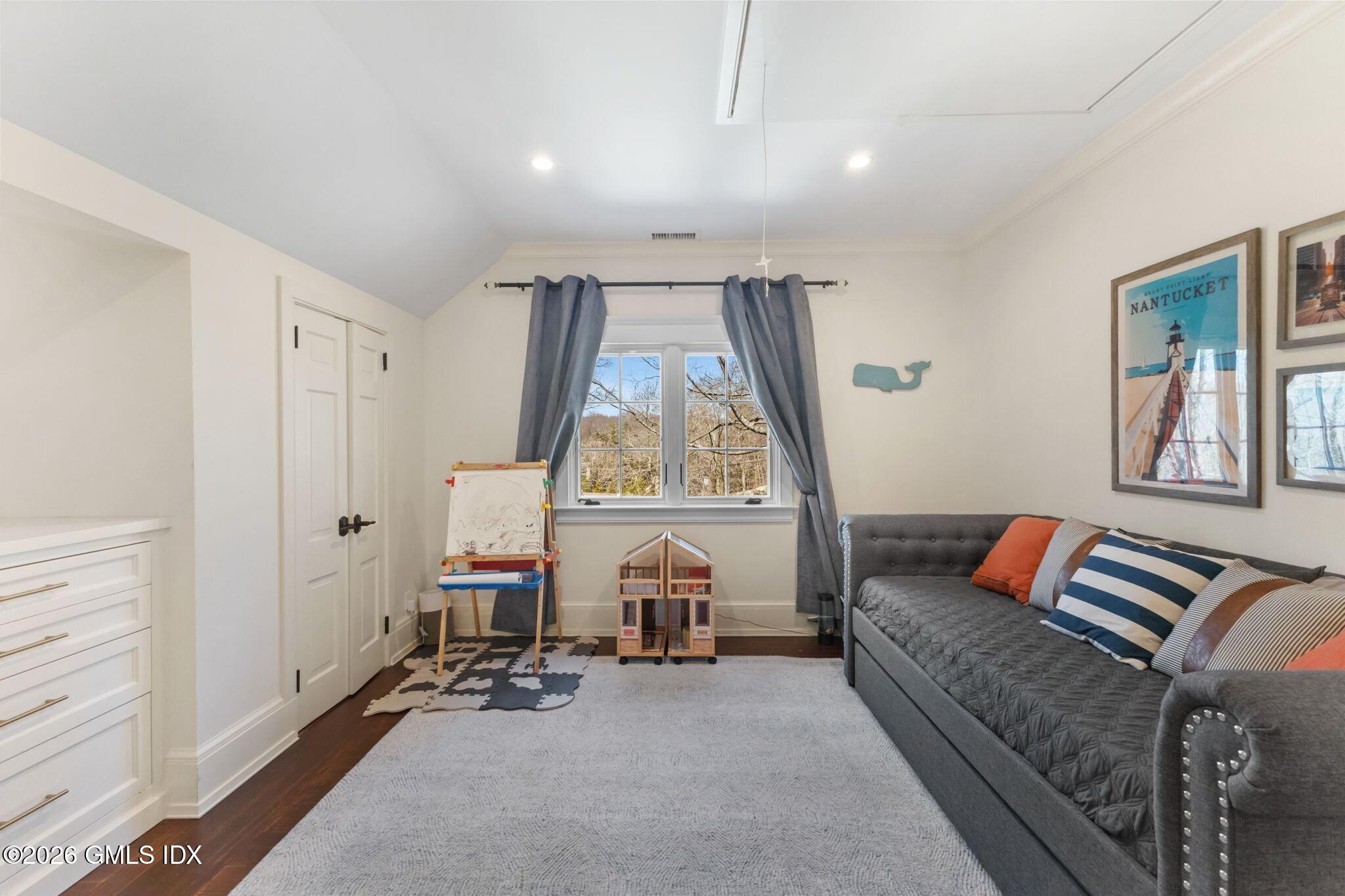 311 Riversville Road Greenwich, CT 06831 - Photo 15 of 32 a living room with furniture and a window