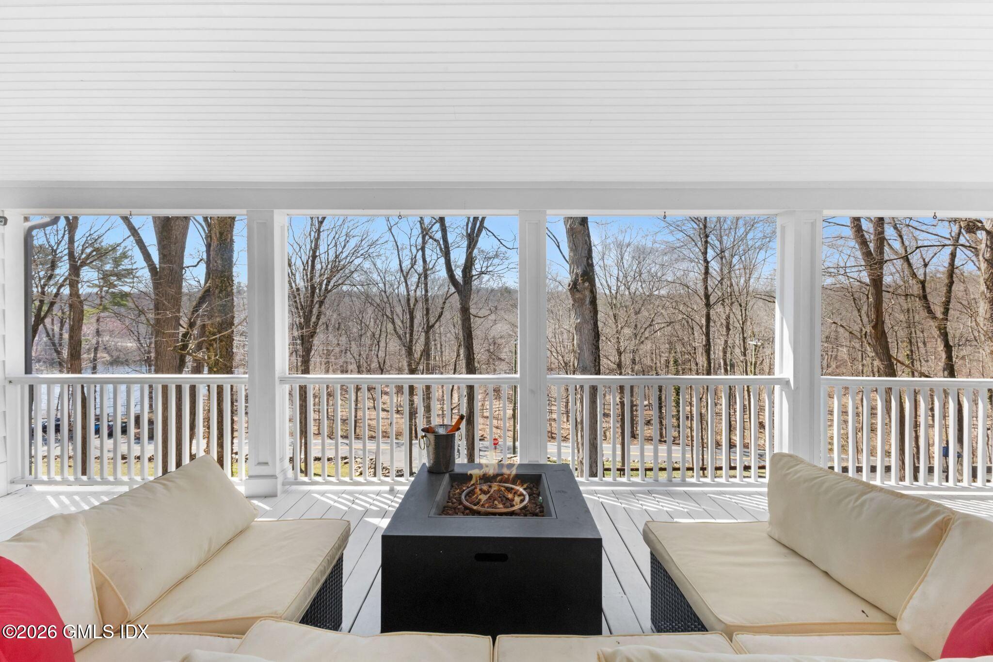 311 Riversville Road Greenwich, CT 06831 - Photo 29 of 32 a view of a balcony with furniture