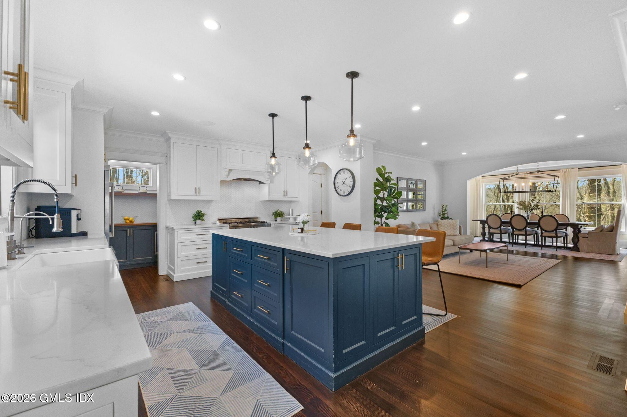 311 Riversville Road Greenwich, CT 06831 - Photo 3 of 32 a kitchen with stainless steel appliances kitchen island granite countertop a large counter top stainless steel appliances and cabinets