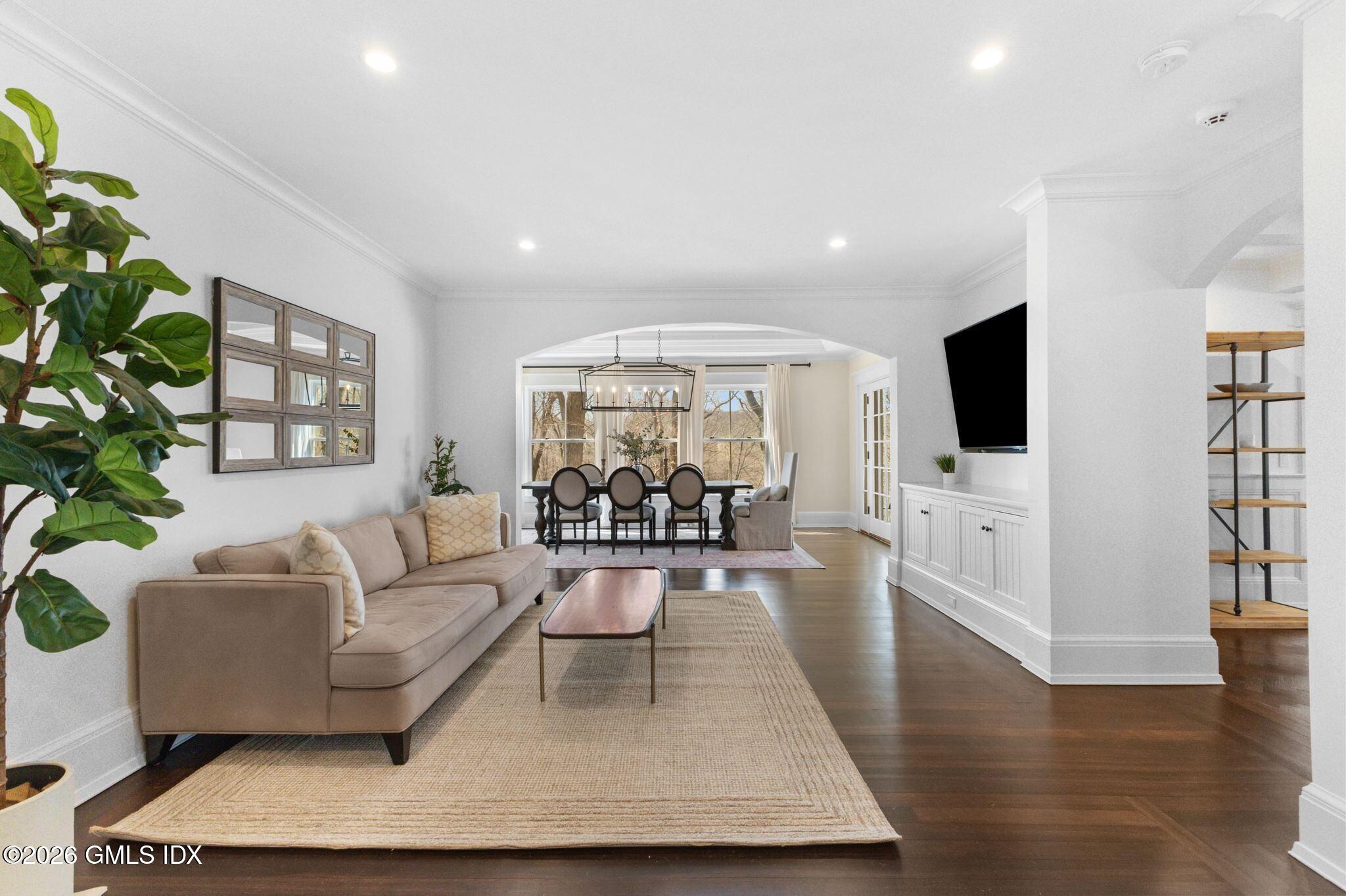 311 Riversville Road Greenwich, CT 06831 - Photo 7 of 32 a living room with furniture and a flat screen tv