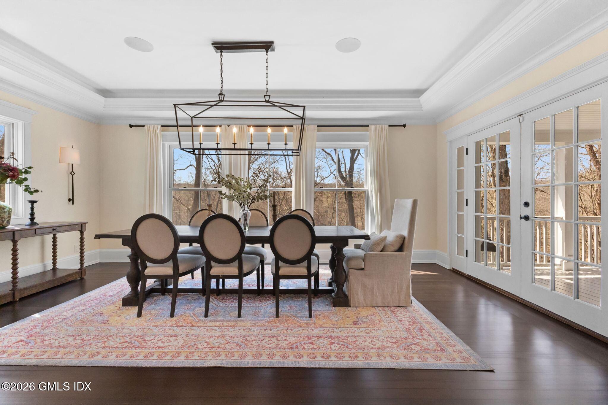 311 Riversville Road Greenwich, CT 06831 - Photo 8 of 32 a view of a dining room with furniture window and wooden floor