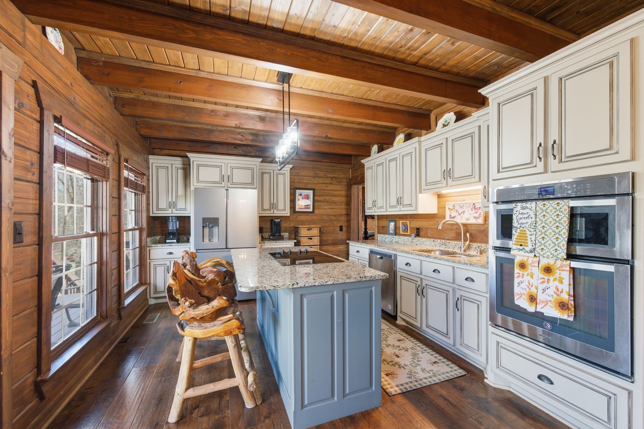 1118 Carrollville Landing Road Clifton, TN 38425 - Photo 20 of 92 a kitchen with stainless steel appliances granite countertop a stove and a refrigerator