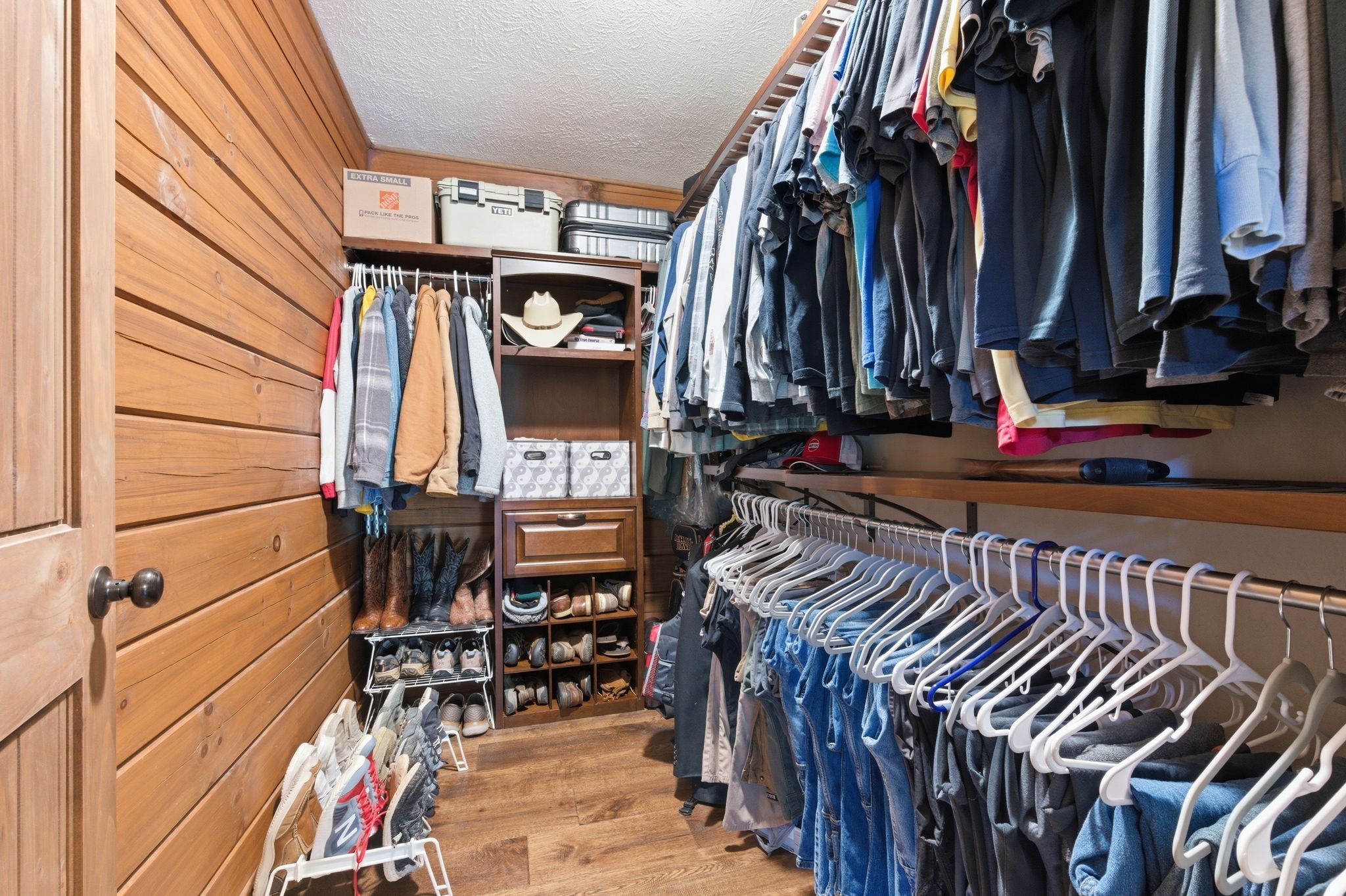 1118 Carrollville Landing Road Clifton, TN 38425 - Photo 34 of 92 a view of walk in closet with clothes and shoes