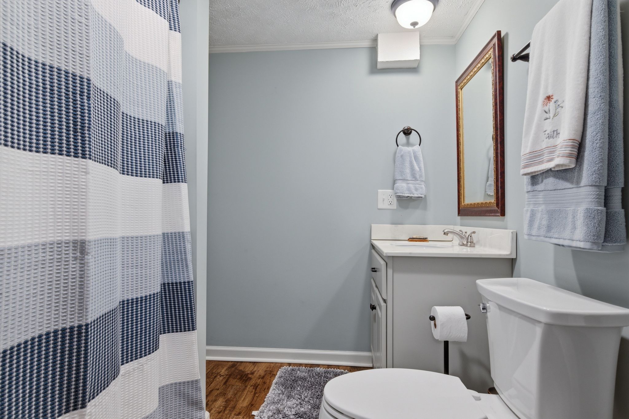 1118 Carrollville Landing Road Clifton, TN 38425 - Photo 53 of 92 a bathroom with a toilet sink and mirror
