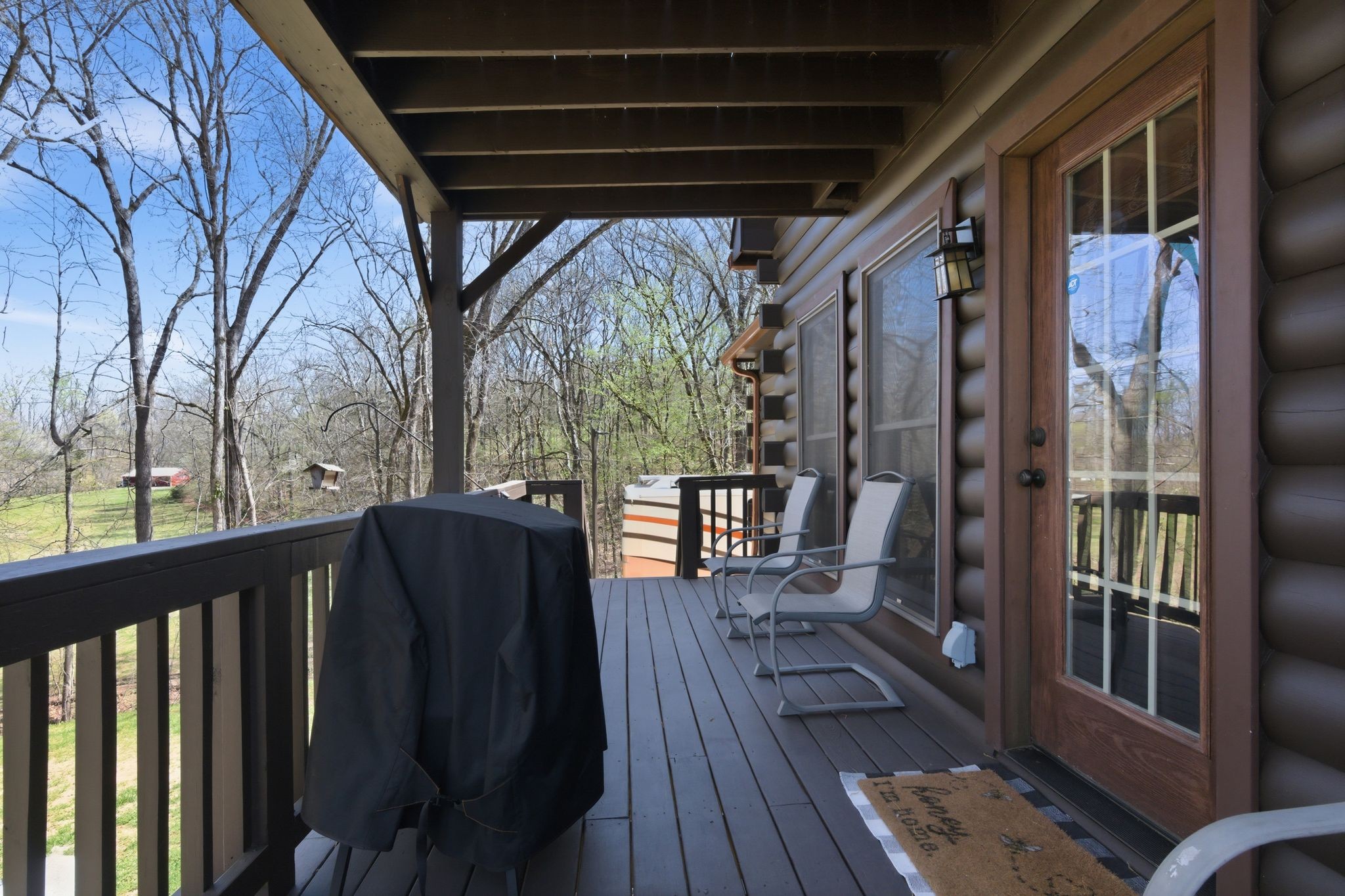 1118 Carrollville Landing Road Clifton, TN 38425 - Photo 57 of 92 a view of balcony with wooden floor and outdoor seating