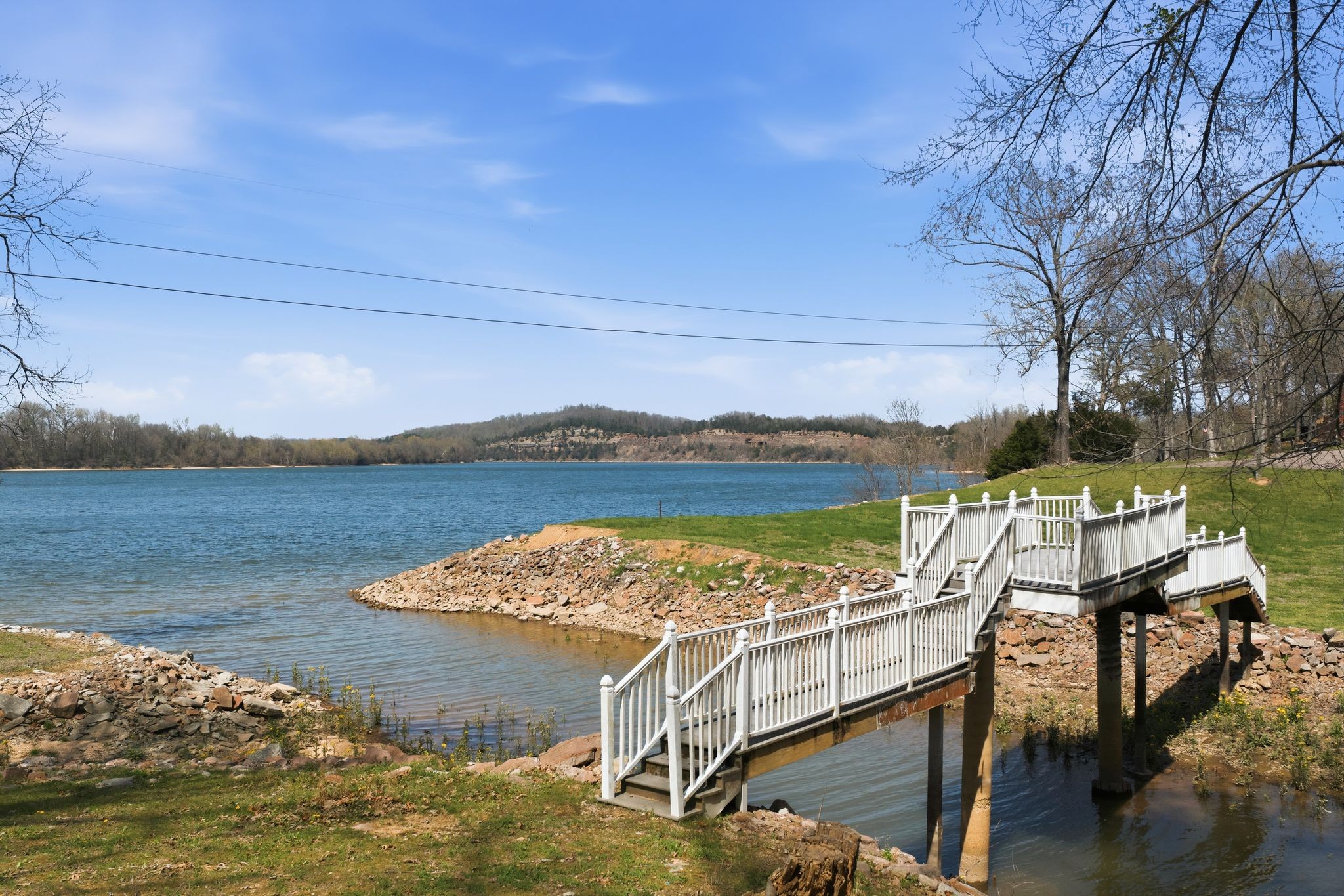 1118 Carrollville Landing Road Clifton, TN 38425 - Photo 64 of 92 a view of a lake with couches in the patio