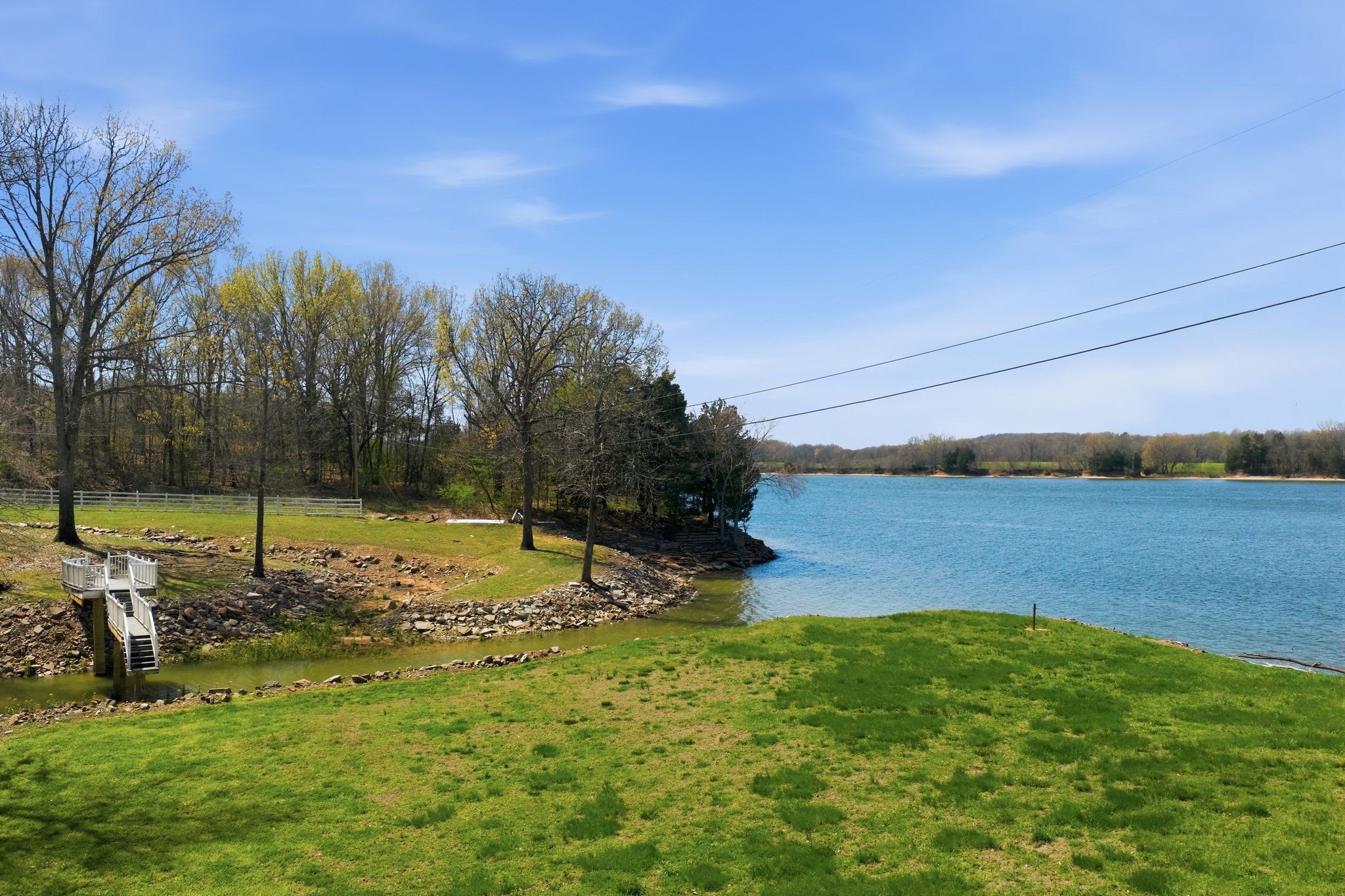1118 Carrollville Landing Road Clifton, TN 38425 - Photo 66 of 92 a view of a lake with a yard