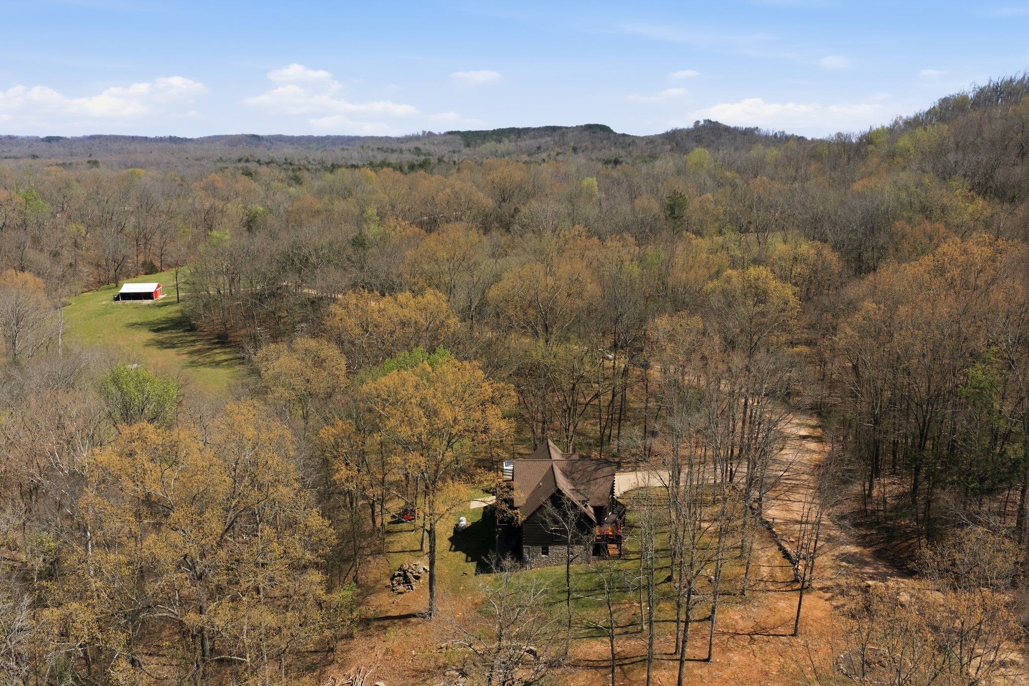 1118 Carrollville Landing Road Clifton, TN 38425 - Photo 73 of 92 a view of a city with lush green forest