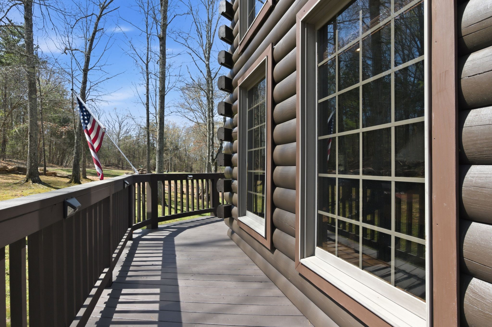 1118 Carrollville Landing Road Clifton, TN 38425 - Photo 8 of 92 a view of balcony with wooden floor and windows