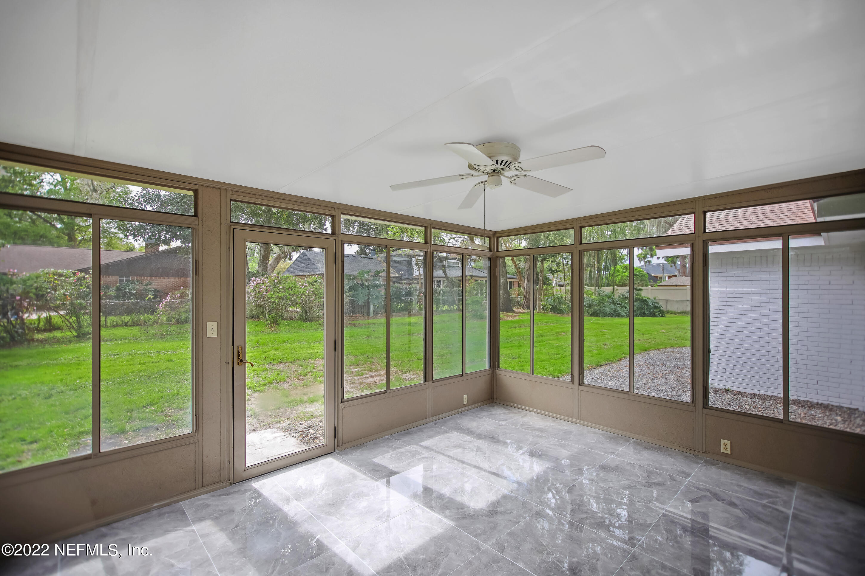 9416 Kells Road Jacksonville, FL 32257 - Photo 33 of 41 a view of an entryway with a garden