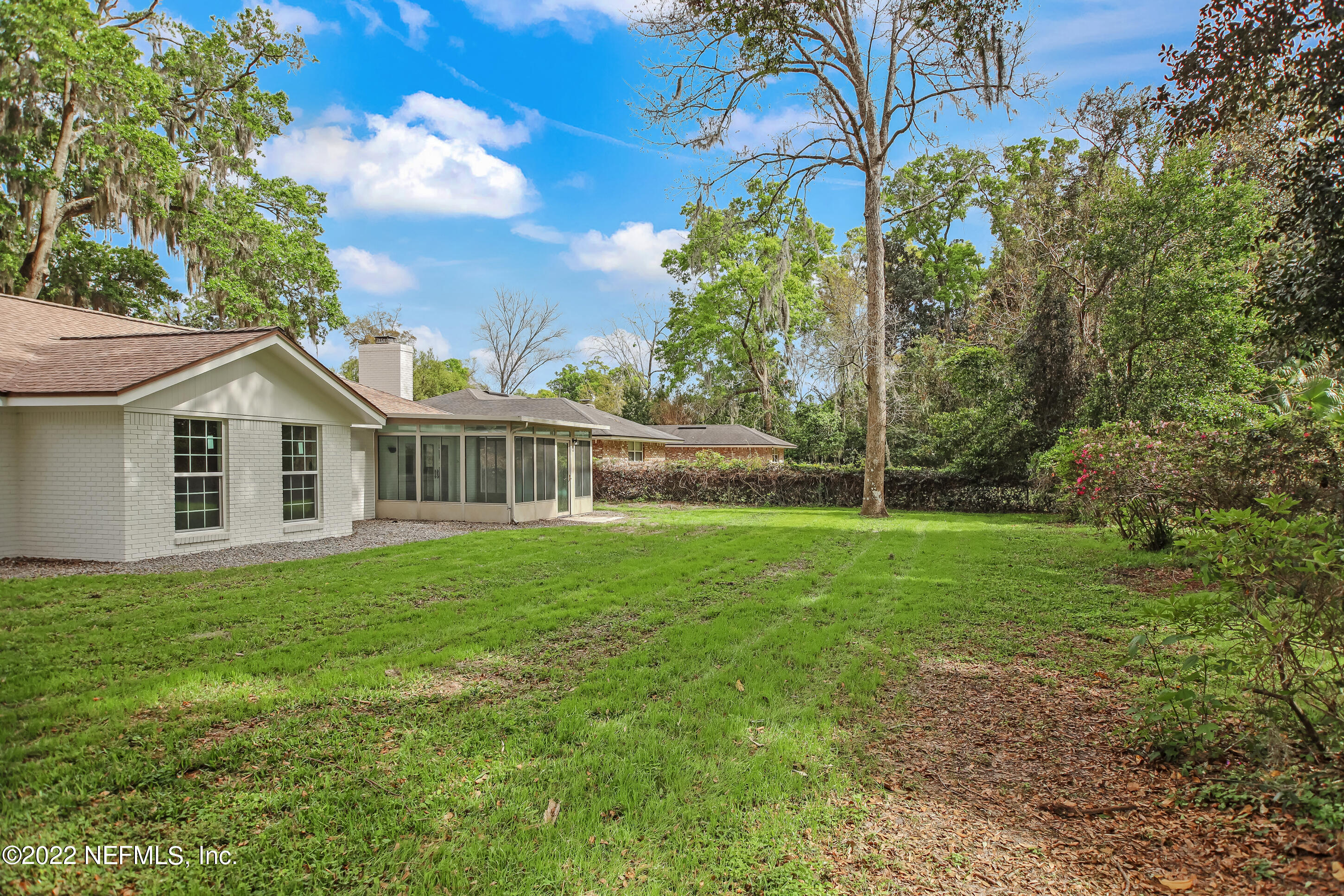 9416 Kells Road Jacksonville, FL 32257 - Photo 37 of 41 a front view of a house with a yard