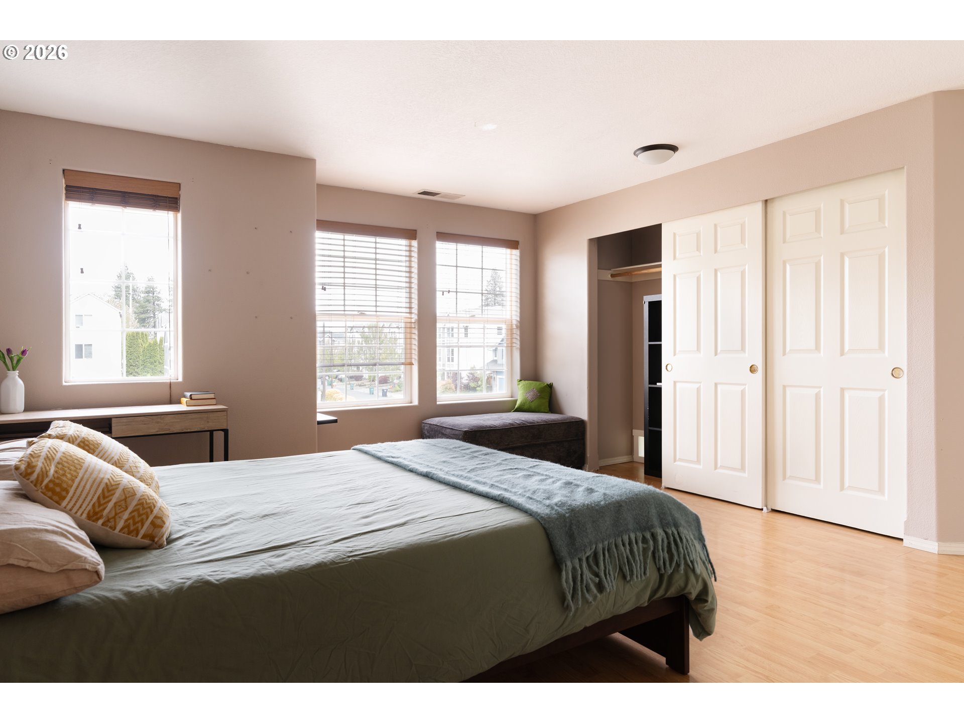4083 Southwest 182nd Place Beaverton, OR 97078 - Photo 11 of 27 a bedroom with a bed and window