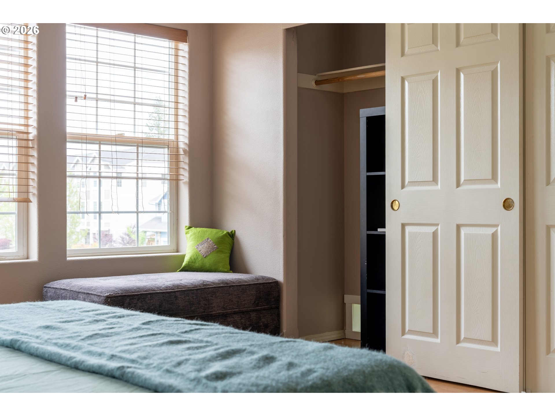 4083 Southwest 182nd Place Beaverton, OR 97078 - Photo 12 of 27 a bedroom with a bed and a window