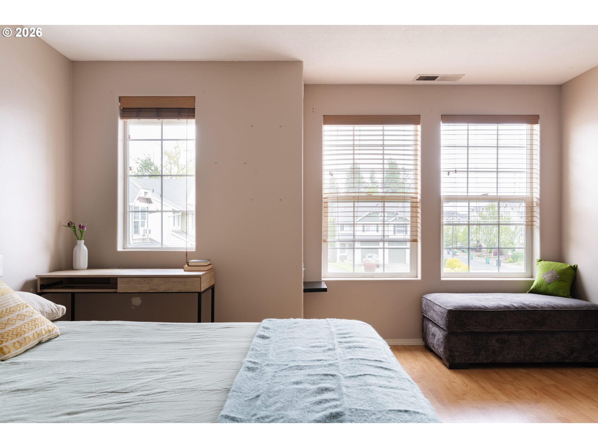 4083 Southwest 182nd Place Beaverton, OR 97078 - Photo 16 of 27 a bedroom with a bed and a window