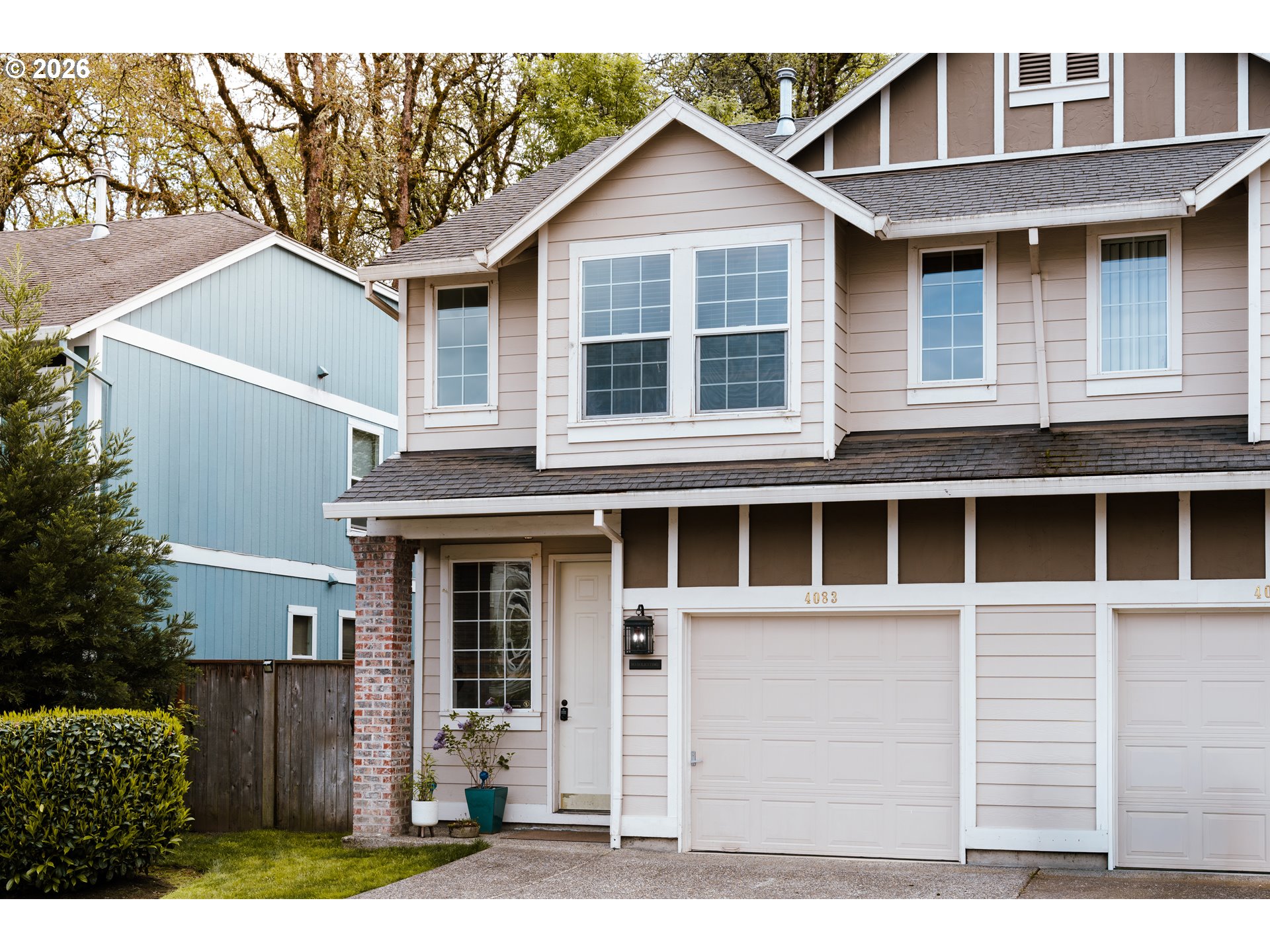 4083 Southwest 182nd Place Beaverton, OR 97078 - Photo 24 of 27 a front view of a house with a yard