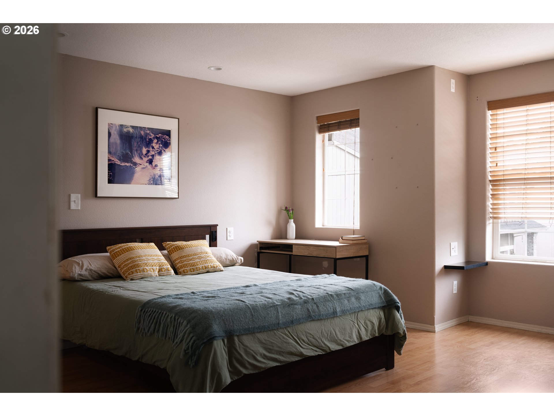 4083 Southwest 182nd Place Beaverton, OR 97078 - Photo 9 of 27 a bedroom with a bed and window