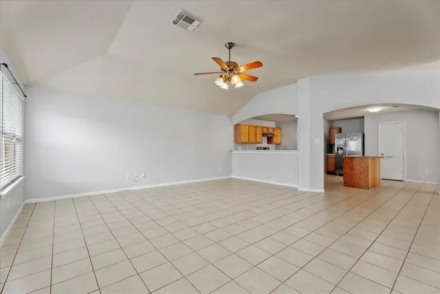 a view of a kitchen with a dishwasher and cabinets