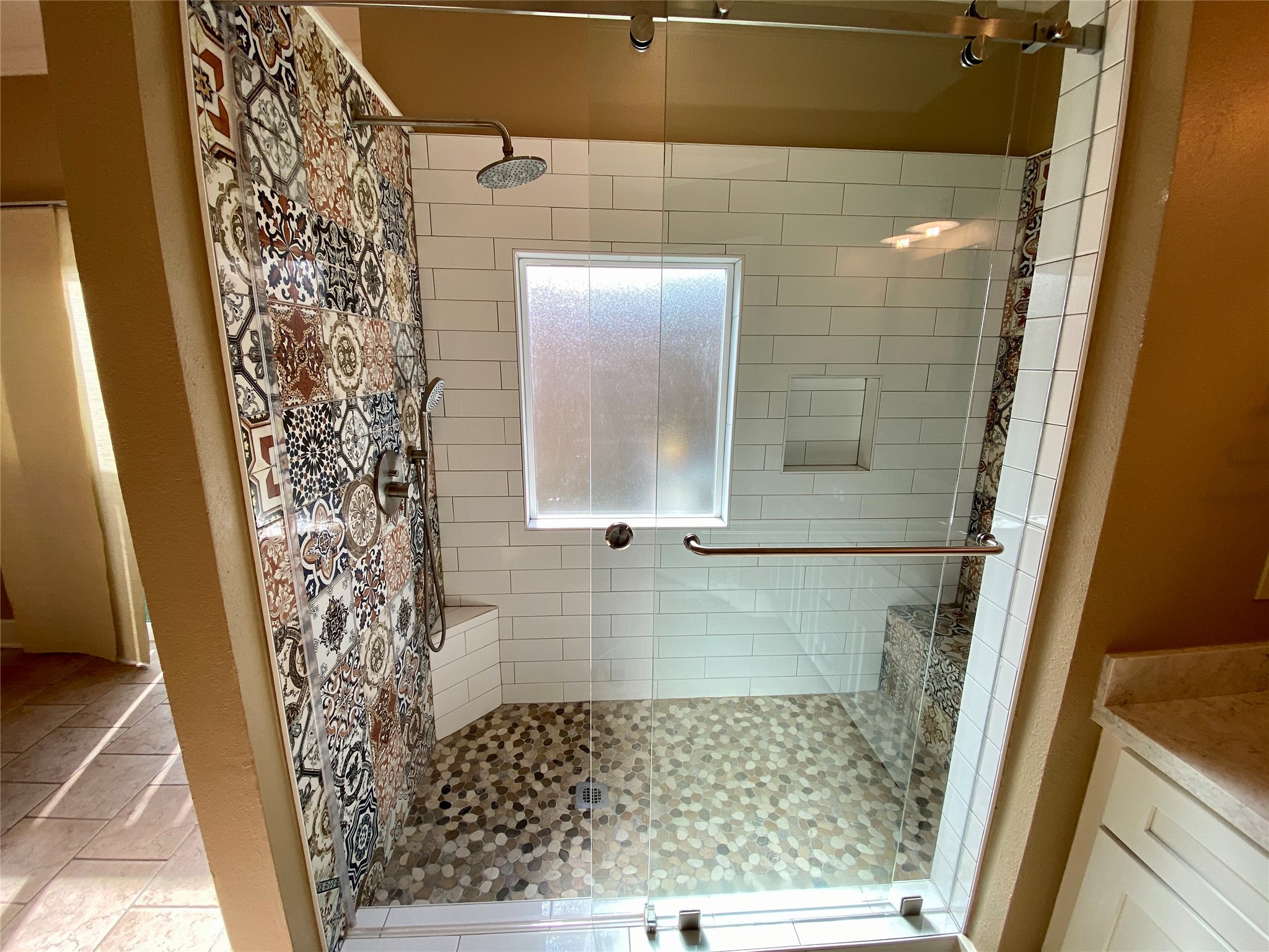 735 Arlington Street, Unit 3 Houston, TX 77007 - Photo 24 of 32 Spacious, walk-in shower with custom tile accents.