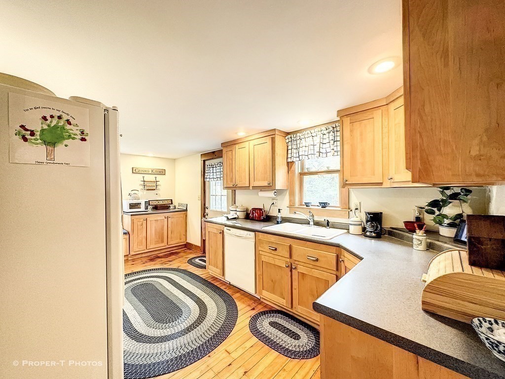 23 North Leverett Road Montague, MA 01351 - Photo 14 of 35 a kitchen with a sink appliances and cabinets
