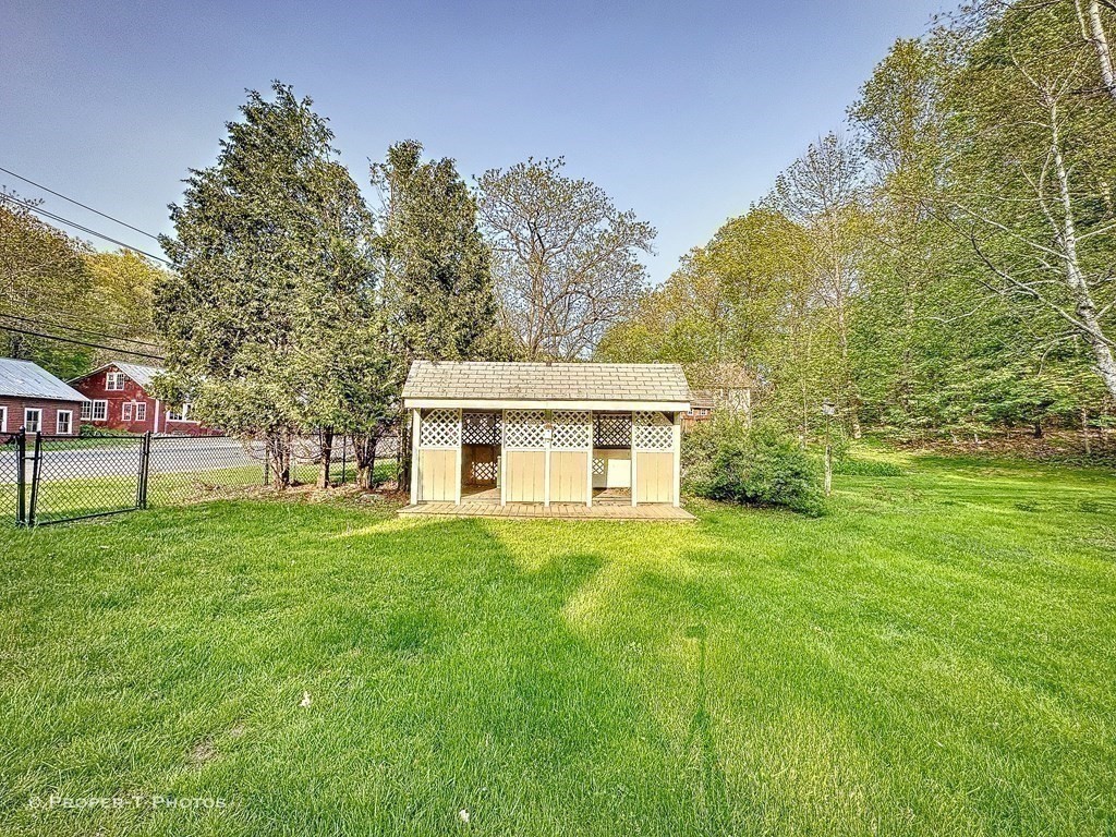 23 North Leverett Road Montague, MA 01351 - Photo 25 of 35 a front view of a house with a garden