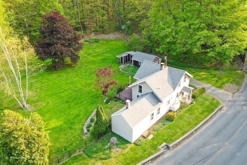 23 North Leverett Road Montague, MA 01351 - Photo 28 of 35 an aerial view of a house with a yard