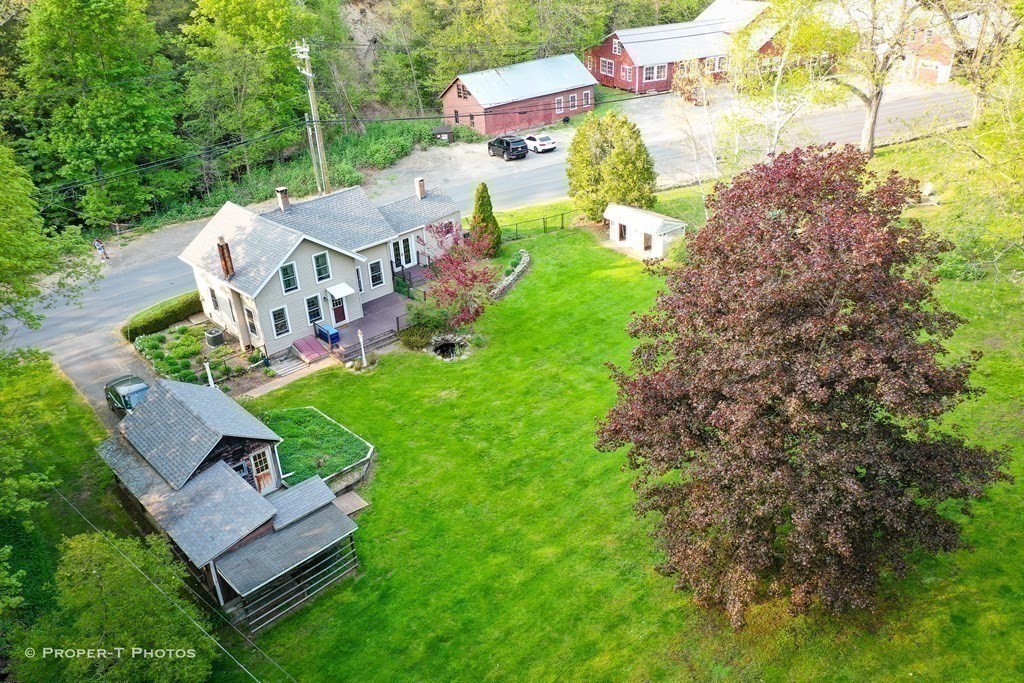 23 North Leverett Road Montague, MA 01351 - Photo 31 of 35 an aerial view of residential house with outdoor space and trees all around