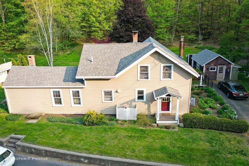 23 North Leverett Road Montague, MA 01351 - Photo 33 of 35 a view of a house with a yard