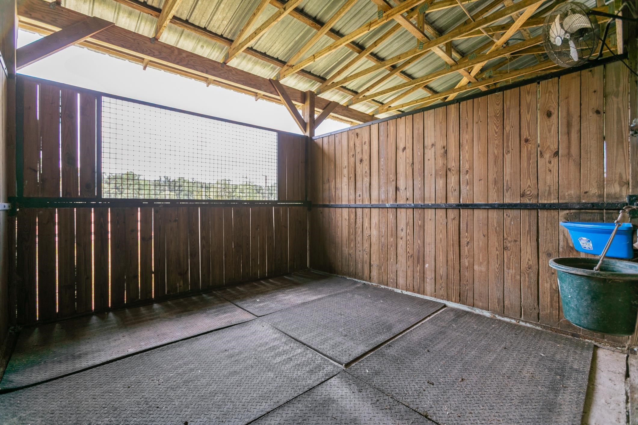5210 County Road 305 Bunnell, FL 32110 - Photo 18 of 79 a view of a backyard with wooden fence