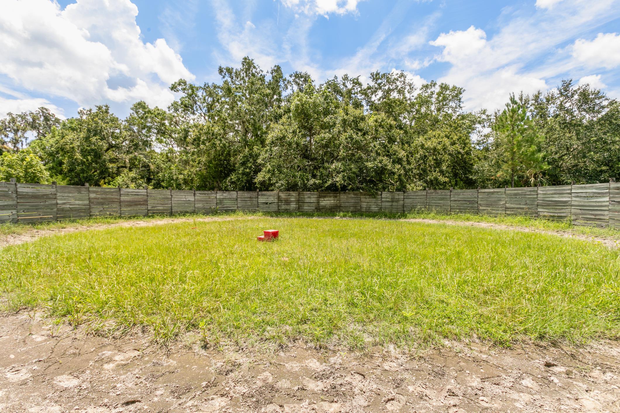 5210 County Road 305 Bunnell, FL 32110 - Photo 46 of 79 a view of a swimming pool and a yard