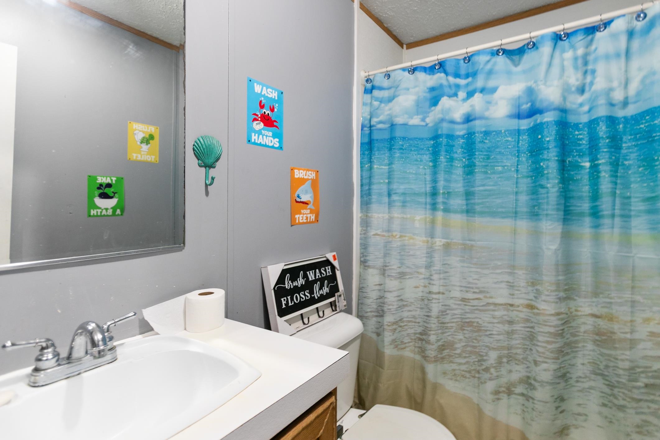5210 County Road 305 Bunnell, FL 32110 - Photo 66 of 79 a bathroom with a sink and a toilet